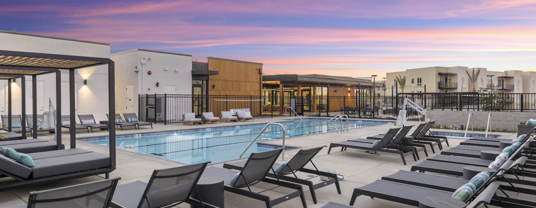 pool with reclining seats and modern stonework