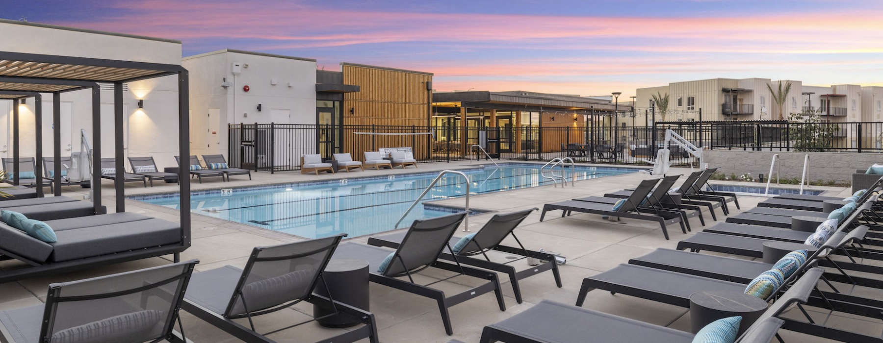 pool with reclining seats and modern stonework